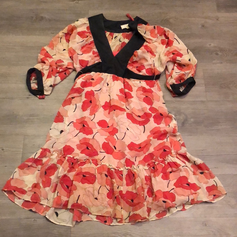 Anthropologie floral print dress with black bow.